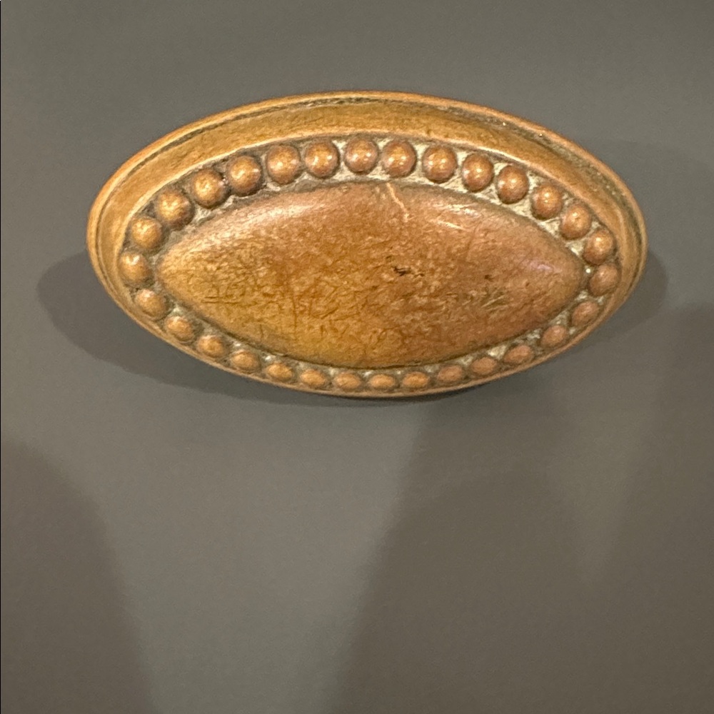 ANTIQUE BRASS OVAL DOOR KNOB WITH BEADING